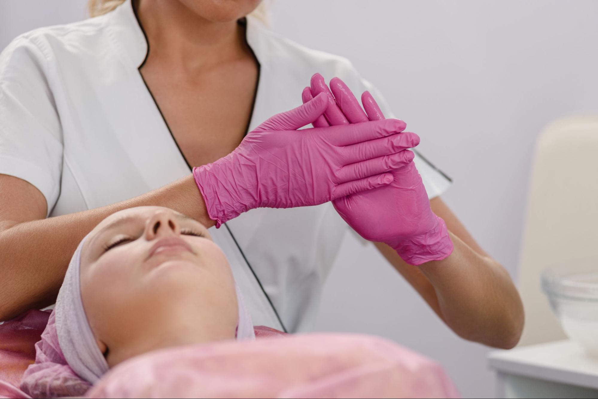 Professional performing a Diamond Glow facial in Safety Harbor to restore skin hydration and radiance.